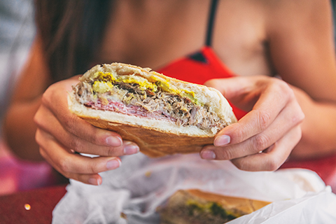 An up close photo of a traditional Cuban sandwich.