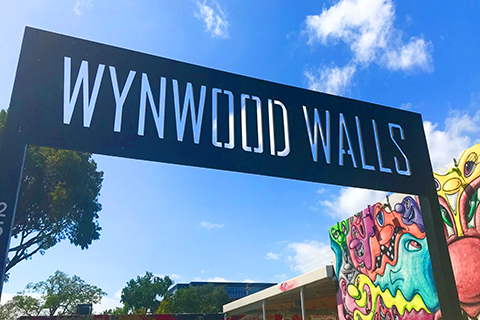 A stock photo of the entrance sign to Wynwood Walls in Miami, Florida.